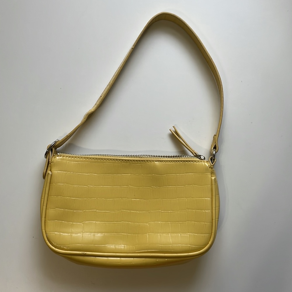 Yellow crocodile embossed purse